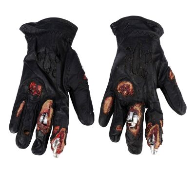 407. Pair of the Terminator's (Arnold Schwarzenegger) Battle-Damaged Right-Hand Gloves with Endoskeleton Fingers ### TERMINATOR 2: JUDGMENT DAY (1991)