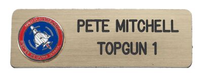 412. Pete "Maverick" Mitchell's (Tom Cruise) Production-Made Uniform Nameplate ### TOP GUN (1986)