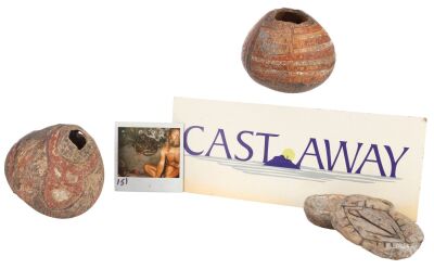 554. Chuck Noland's (Tom Hanks) Carvings with Continuity Photo and Parking Placard ### CAST AWAY (2000)