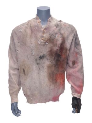 564. Gabe Walker's (Sylvester Stallone) Sweater, Shirt, and Gloves ### CLIFFHANGER (1993)