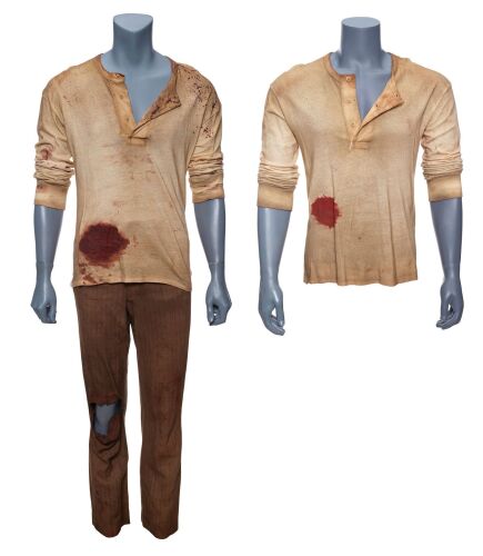 578. Jake Lonergan's (Daniel Craig) Screen-Matched Bloodied Costume with Additional Shirt ### COWBOYS & ALIENS (2011)
