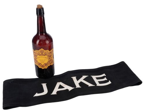 587. Jake Lonergan's (Daniel Craig) Whiskey Bottle and Chairback ### COWBOYS & ALIENS (2011)