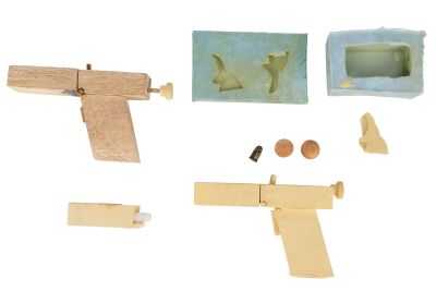 709. Mitch Leary's (John Malkovich) Production-Made Composite Pistol and Wooden Master Pattern Pistol with Screen-Matched Trigger Mold and Barrel Mold ### IN THE LINE OF FIRE (1993)