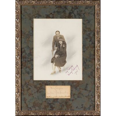 844. Matted and Framed Vintage Original Double-Weight Matte Photograph and Cut Signatures (2) (14" x 19") Signed by Mary Pickford and Douglas Fairbanks (Beckett COA); From the Donna Hill Collection; V ### MARY PICKFORD AND DOUGLAS FAIRBANKS (c.1930)