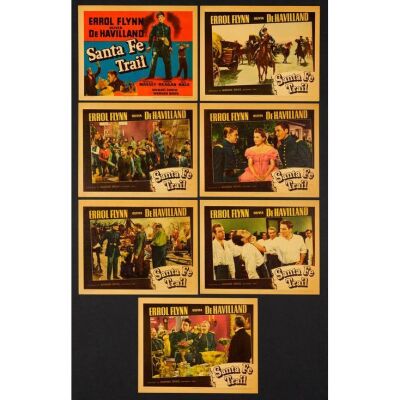 1014. Lobby Cards (7) With Paper Sleeve (11" x 14"); From The Royal Theatre Collection; Linen Finish; Very Fine+ ### SANTA FE TRAIL (1940)