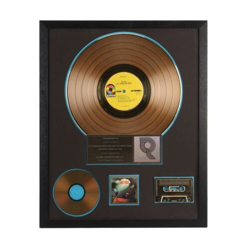3. AC/DC - Let There Be Rock Gold Disc Award Presented to Bon Scott