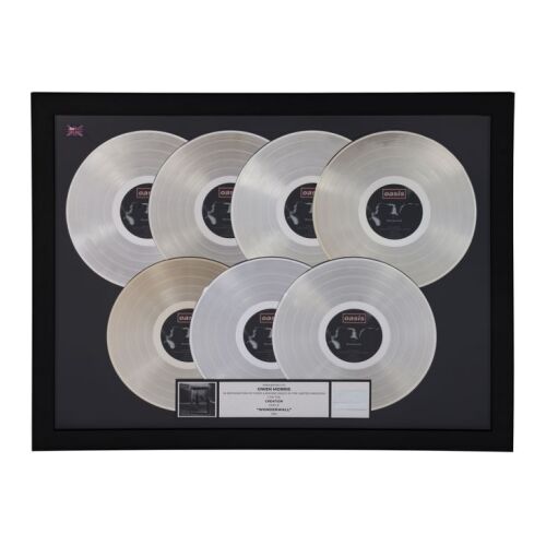 291. OASIS - Wonderwall Seven Platinum Disc Award Presented to Owen Morris