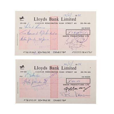 334. QUEEN - Pair of 1975 Lloyds Bank Cheques Signed by Freddie Mercury, Brian May, Roger Taylor and John Deacon