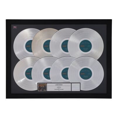 457. Definitely Maybe Eight Platinum Disc Award Presented to Owen