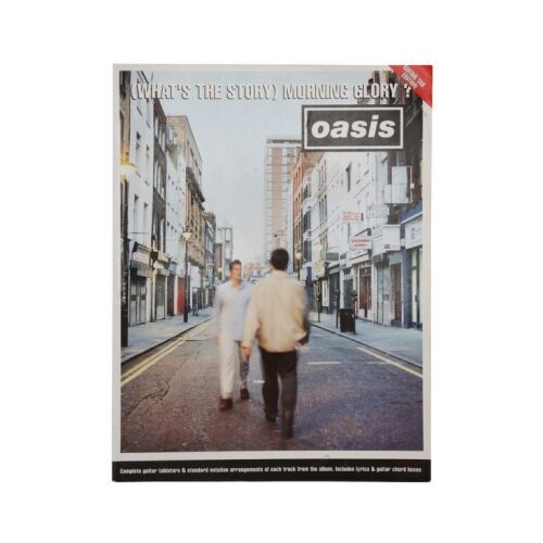 476. Noel Gallagher, Liam Gallagher and Paul "Guigsy" McGuigan-Autographed (What's the Story) Morning Glory? Guitar Tab Book ### OASIS