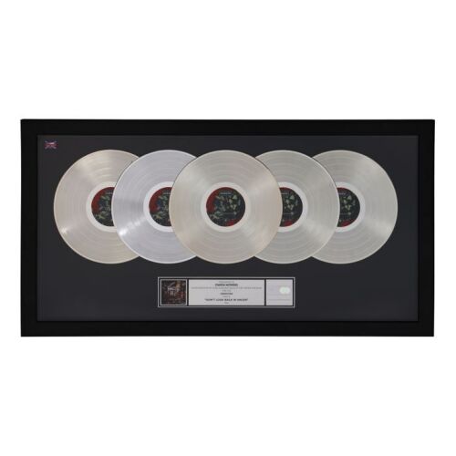 487. Don't Look Back in Anger Five Platinum Disc Award Presented to Owen Morris ### OASIS
