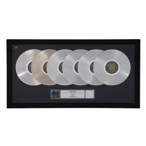 503. Be Here Now Six Platinum Disc Award Presented to Owen Morris ### OASIS