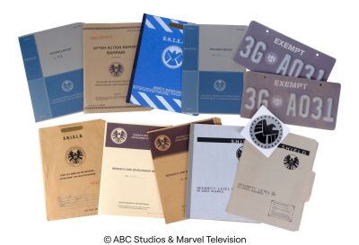 Lot #40: Set of Nine S.H.I.E.L.D. File Folders and Two License Plates ### MARVEL'S AGENTS OF S.H.I.E.L.D. (2013-2020)