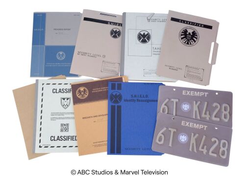 Lot #63: Set of Eight S.H.I.E.L.D. File Folders and Two Distressed License Plates ### MARVEL'S AGENTS OF S.H.I.E.L.D. (2013-2020)