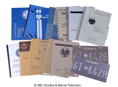 Lot #106: Werner von Strucker's Assessment Report with 12 Additional S.H.I.E.L.D. File Folders and Two License Plates ### MARVEL'S AGENTS OF S.H.I.E.L.D. (2013-2020)