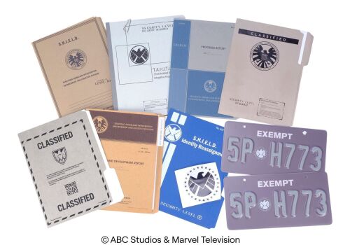 Lot #119: Set of Seven S.H.I.E.L.D. File Folders and Two License Plates ### MARVEL'S AGENTS OF S.H.I.E.L.D. (2013-2020)