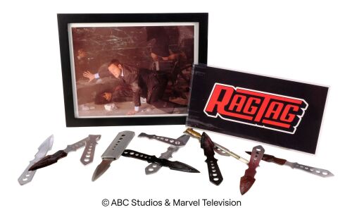 Lot #130: Jeffrey Mace's Framed Vienna Photo with Anton "Superior" Ivanov's Set of Throwing Knife Accessories and "Ragtag" Production Placard ### MARVEL'S AGENTS OF S.H.I.E.L.D. (2013-2020)