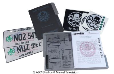Lot #173: Pair of HYDRA Document Folders with Decals and Two License Plates ### MARVEL'S AGENTS OF S.H.I.E.L.D. (2013-2020)
