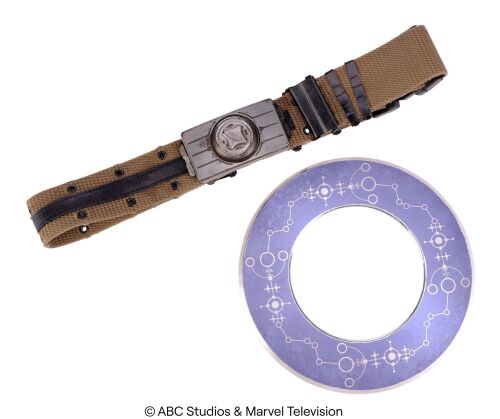 Lot #262: Deke Shaw's Stunt Gravitonium Belt with Enoch's Chronicom Interplanetary Conveyance Disc ### MARVEL'S AGENTS OF S.H.I.E.L.D. (2013-2020)