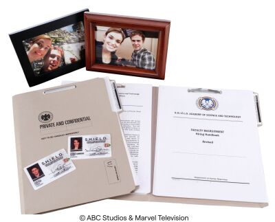 Lot #271: Leo Fitz and Jemma Simmons' Framed Photographs with S.H.I.E.L.D. IDs and Academy Files ### MARVEL'S AGENTS OF S.H.I.E.L.D. (2013-2020)