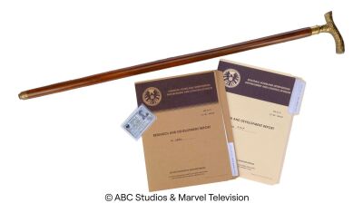 Lot #303: Daniel Sousa's Cane and S.H.I.E.L.D. ID with Two S.H.I.E.L.D. File Folders ### MARVEL'S AGENTS OF S.H.I.E.L.D. (2013-2020)
