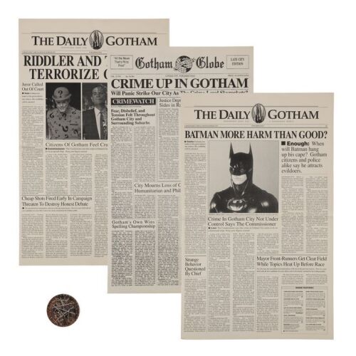 68. Two-Face's (Tommy Lee Jones) Dirtied Coin and Set of Three Gotham Newspapers ### BATMAN FOREVER (1995)/BATMAN & ROBIN (1997)