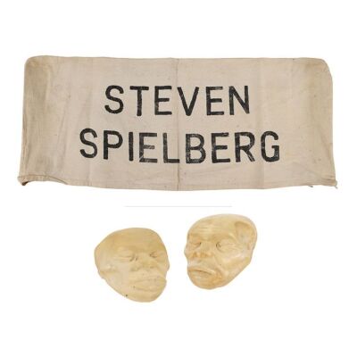 224. Alan Cassie Collection: Steven Spielberg's Chair Back and a Pair of Set Decoration Acrylic Heads ### INDIANA JONES AND THE TEMPLE OF DOOM (1984)