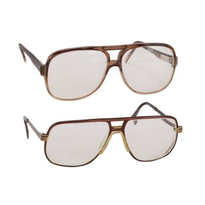 854. Two Pairs of Michael Caine's Aviator-Style Glasses ### MICHAEL CAINE