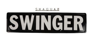 20. Austin Powers' (Mike Myers) 1967 Jaguar E-Type "Shaguar" Badge and "Swinger" License Plate ### AUSTIN POWERS: THE SPY WHO SHAGGED ME (1999)