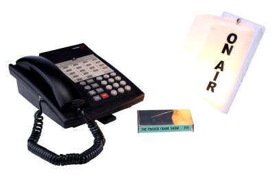 128. Dr. Frasier Crane's (Kelsey Grammer) Light-Up KACL "ON AIR" Studio Light, Broadcast Booth Phone, and "The Frasier Crane Show" Cassette Case ### FRASIER (T.V. SERIES, 1993 - 2004)