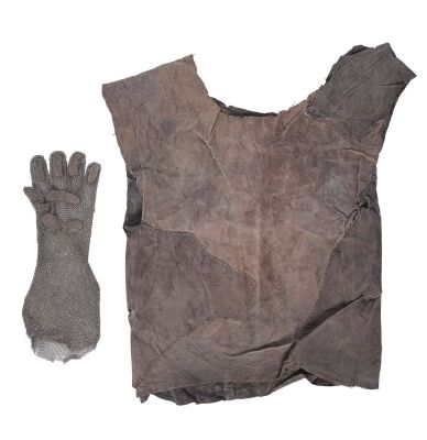 264. Mad Max's (Mel Gibson) Tunic and Aunty Entity's (Tina Turner) Glove ### MAD MAX BEYOND THUNDERDOME (1985)