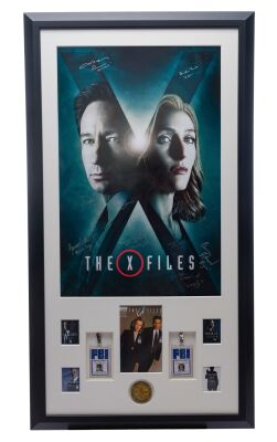 418. Fox Mulder's (David Duchovny) and Dana Scully's (Gillian Anderson) Framed FBI IDs in Key Cast-Autographed Display ### THE X-FILES (T.V. SERIES, 1993 - 2002)