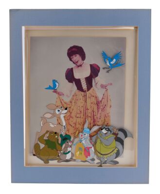 438. Matted Hand-Painted Animation Cel with Snow White Violet Newstead (Lily Tomlin) Photograph Background ### 9 TO 5 (1980)