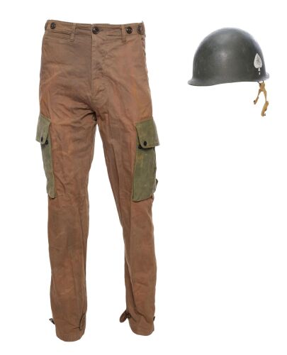 492. Major Richard D. Winters' (Damian Lewis) Fatigue Pants with Production-Made Helmet ### BAND OF BROTHERS (T.V. SERIES, 2001)