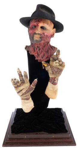 626. Darkman's (Liam Neeson) Hat and Prosthetic Cowl with Hands on Display ### DARKMAN (1990)