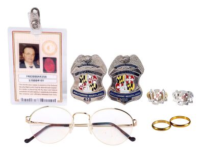 659. Mike Papac Collection: Thomas Reynolds' (Jon Voight) Accessories with Edward Lyle's (Gene Hackman) Police Pin and Badges ### ENEMY OF THE STATE (1998)