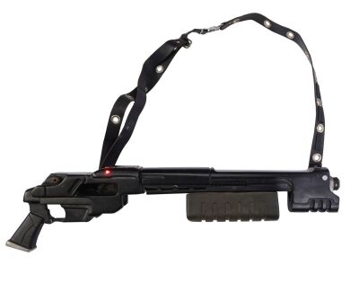 847. Judge Joseph Dredd's (Sylvester Stallone) Screen-Matched Light-Up Fargo Shotgun Casing ### JUDGE DREDD (1995)