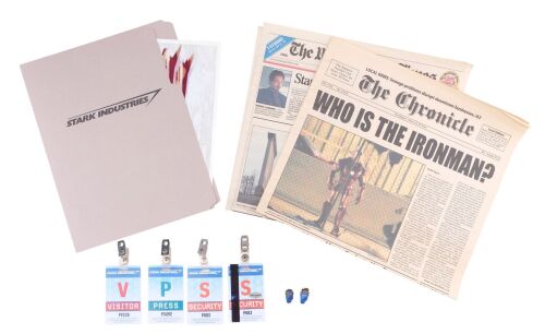 899. Stark Industries File and Access Cards with Pairs of Production-Made Iron Man (Robert Downey Jr.) Newspaper Cover and Sonic Taser Earplugs ### IRON MAN (2008)