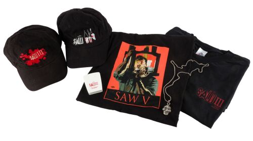 1068. David A. Armstrong Collection: Armstrong's Personal Set of Crew Gifts ### SAW FRANCHISE (2004 - PRESENT)