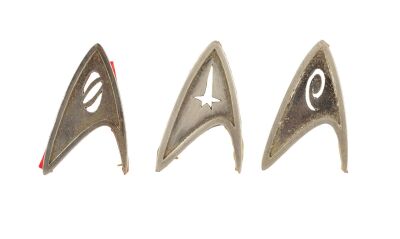 1128. Set of Three Starfleet Badges in Command, Science, and Operations Divisions ### STAR TREK (2009)