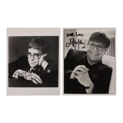 106. Two Elton John-Autographed Photos ### ELTON JOHN