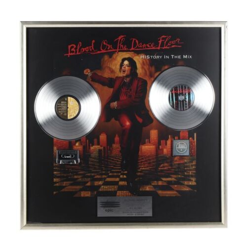 187. Blood on the Dance Floor: HIStory in the Mix Platinum Disc Award Display Presented to Michael Jackson ### MICHAEL JACKSON