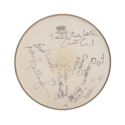 242. Noel Gallagher, Liam Gallagher, Paul "Bonehead" Arthurs, Paul "Guigsy" McGuigan, and Alan White- Autographed Stage-Used Drumskin ### OASIS