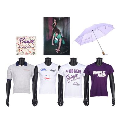 291. The Dr. Fink Collection: Purple Rain Tour Shirts, Promotional Umbrella, World Tour Programme and "Doctor Fink" Autographed Poster ### PRINCE AND THE REVOLUTION