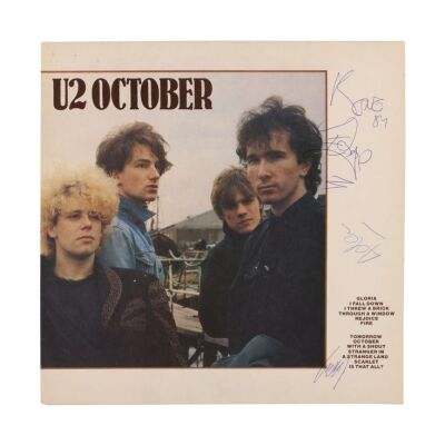 424. Bono, The Edge, Larry Mullen Jr. and Adam Clayton-Autographed October UK Vinyl Sleeve ### U2