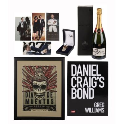 729. Daniel Craig-Autographed Bollinger Champagne, Framed Sam Mendes-Autographed Day of The Dead Crew Poster, Daniel Craig's Bond Book, ACME Whistle Crew Gift and Four Screening Tickets ### JAMES BOND: DANIEL CRAIG (2006 - 2021)