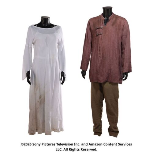 Lot # 50. Egwene al'Vere and Perrin Aybara's Whitecloak Captive Costumes ### WHEEL OF TIME, THE (T.V. SERIES, 2021-2023)