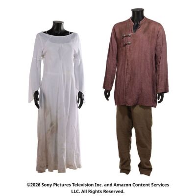Lot # 50. Egwene al'Vere and Perrin Aybara's Whitecloak Captive Costumes ### WHEEL OF TIME, THE (T.V. SERIES, 2021-2023)