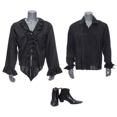 162. Rex Manning's (Maxwell Caulfield) Pairs of Video Shirts and Boots ### EMPIRE RECORDS (1995)