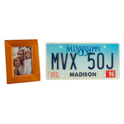 603. Jake Brigance's (Matthew McConaughey) SAAB 900 Cabrio Turbo License Plate and Framed Family Portrait ### TIME TO KILL, A (1996)